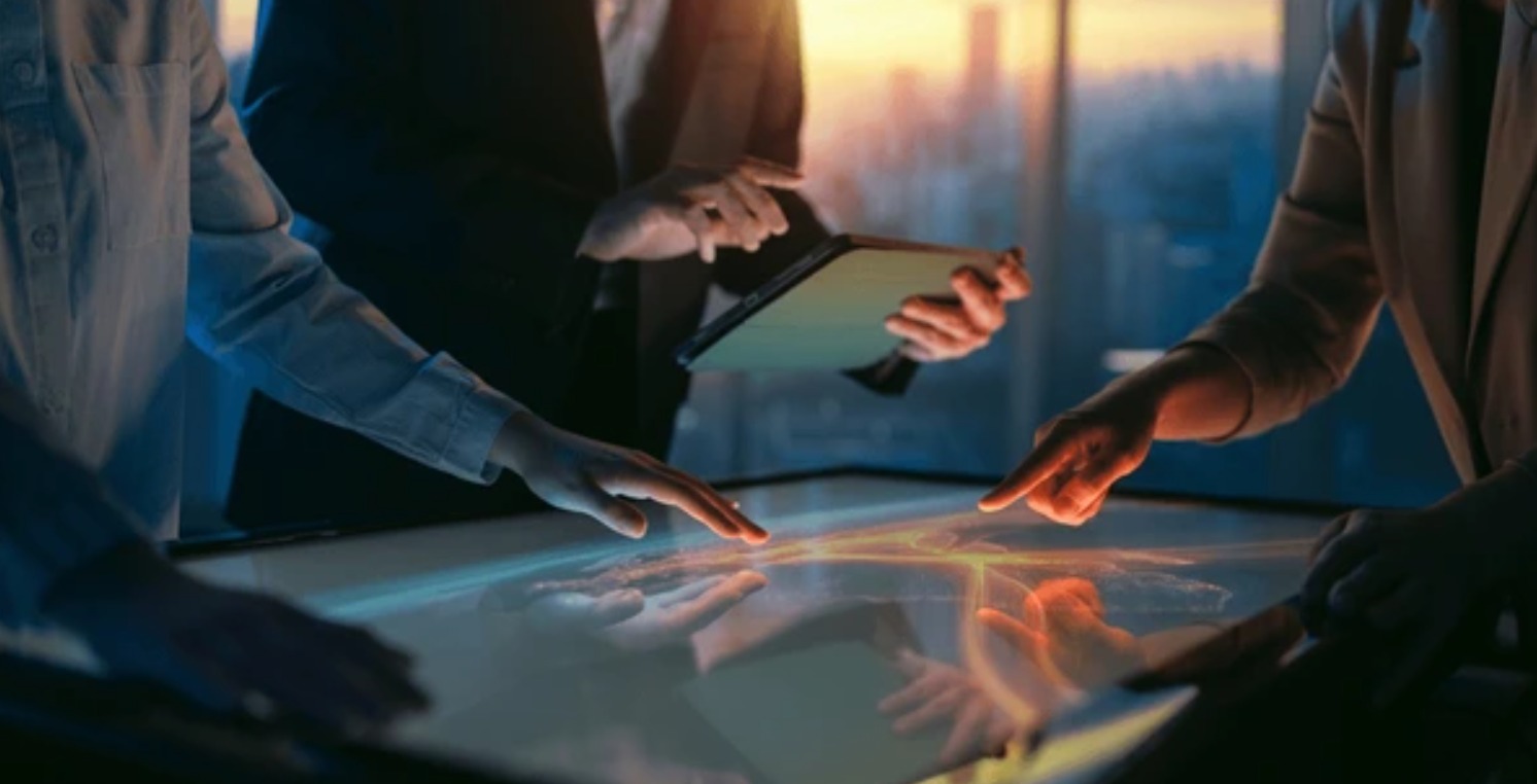 Researchers collaborating around a table